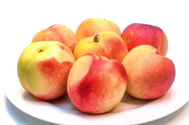 白色背景上分离的新鲜油桃图片下载