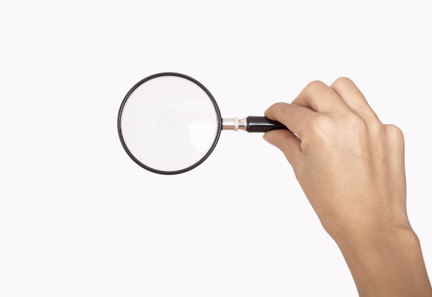 手持放大镜孤立在白色背景上图片下载