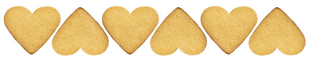 心饼干装饰孤立在白色的背景。甜甜点饼干姜饼烘心装饰背景图案图片下载