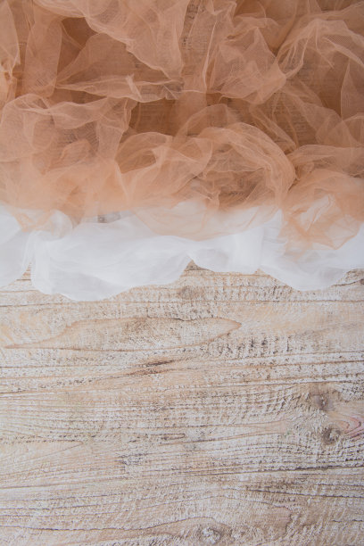 轻量级织物网状花边纹理木桌。这种织物的纹理褶皱得很漂亮图片下载