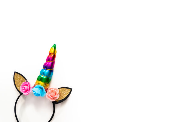 彩色独角兽头带上的白色背景。图片下载