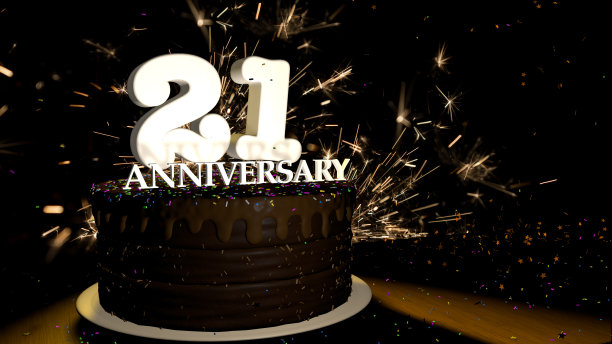 21周年贺卡。木质的桌子上放着巧克力蛋糕，上面装饰着彩色的糖霜和白色的数字，黑色的背景是烟花，星星落在桌子上。三维演示图片下载