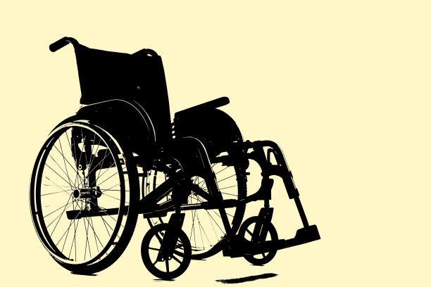 黄色背景的轮椅剪影图片下载