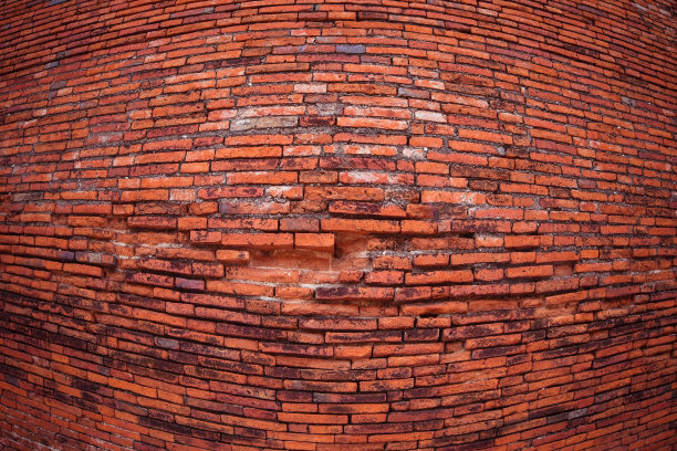 红砖的背景侵蚀着古老的遗址图片下载