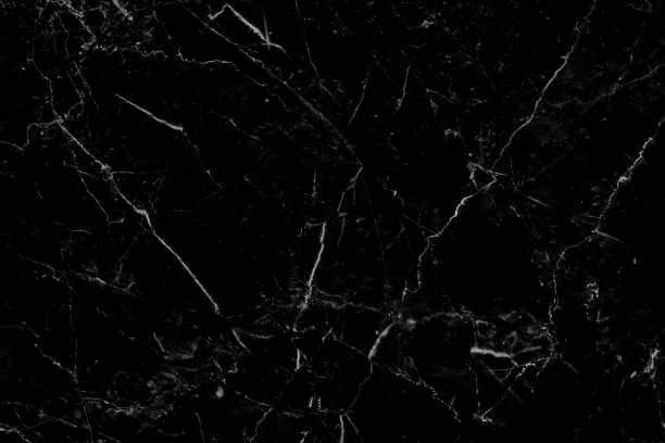 黑色大理石纹理抽象背景图案设计。图片下载