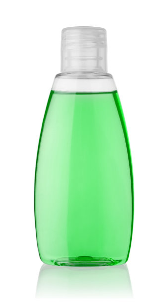 绿色沐浴露在透明塑料容器上隔离白色图片下载