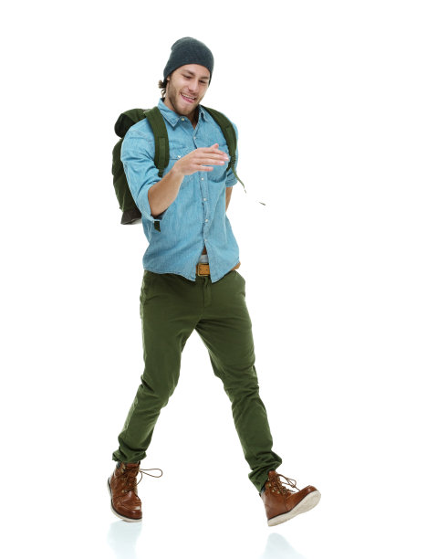 英俊的男子戴着无檐帽跳舞图片下载