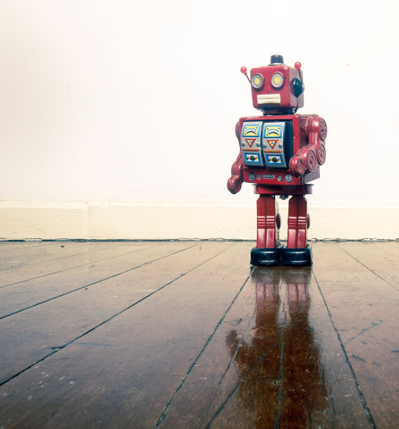 复古红色机器人独自站立图片下载