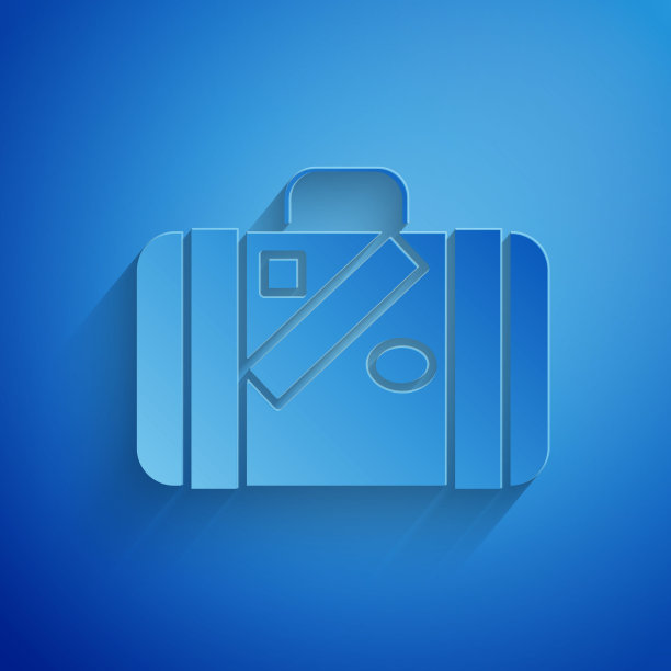 剪纸手提箱旅行和贴纸图标孤立在蓝色背景。旅行的行李的迹象。旅行的行李图标。纸艺术风格。矢量图图片下载