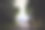 后视图的人与头手电筒站在森林地面道路高大明亮的照亮云杉下美丽的深蓝色天空。夜木景观和冒险。图片下载