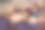 温泉沙龙的尼泊尔佛铜歌唱碗。年轻漂亮的女人做按摩治疗唱歌碗在温泉对着瀑布。健全的治疗，娱乐，冥想，健康的生活方式和身体护理理念图片下载