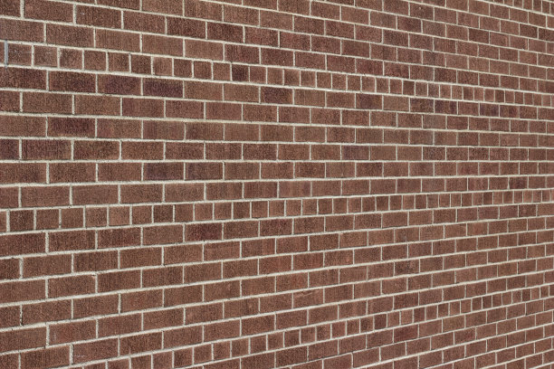 现代复古粗糙纹理棕色砖墙背景在普通粘结砖图案图片下载