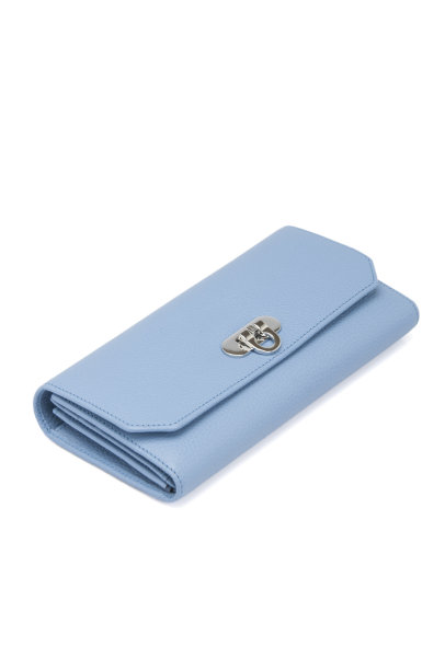 蓝色皮革女人的钱包在白色的背景图片下载