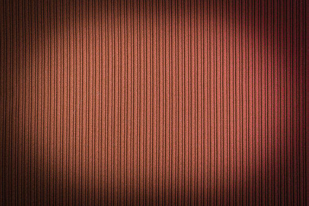 装饰背景为棕橙色，条纹纹理渐晕渐变。墙纸。艺术。设计。图片下载