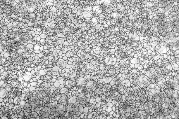 蓝色肥皂泡-水抽象宏观泡沫背景，宏观接近的肥皂泡沫，不断增长的液体有机泡沫图片下载