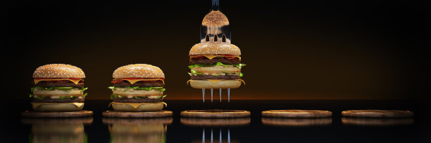 一个小汉堡卡在叉子里。充足营养的概念。三维渲染图片下载