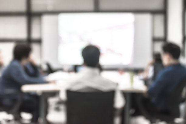 模糊办公室会议背景商务人员工作组在会议室的讨论图片下载