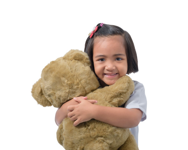 可爱的小亚洲女孩医生微笑，而穿着医生的制服图片下载