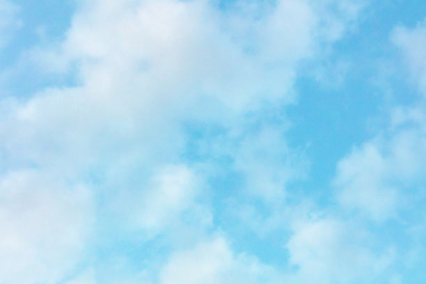 明亮的蓝天和蓬松的云彩，一个抽象的背景图片下载