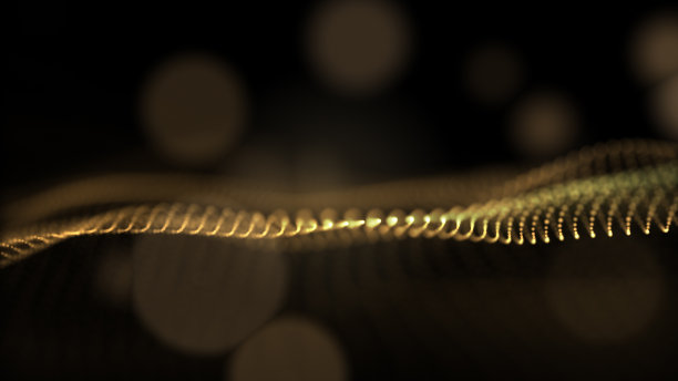 一个抽象的海景与模糊的序列运动的充满活力的黄金颗粒。图片下载