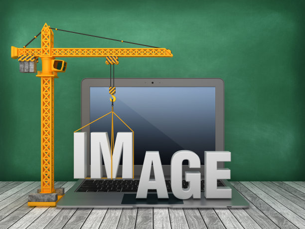 塔吊和笔记本电脑与图像字黑板背景- 3D渲染图片下载