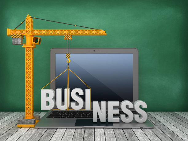 塔吊和笔记本电脑与商业字在黑板背景- 3D渲染图片下载