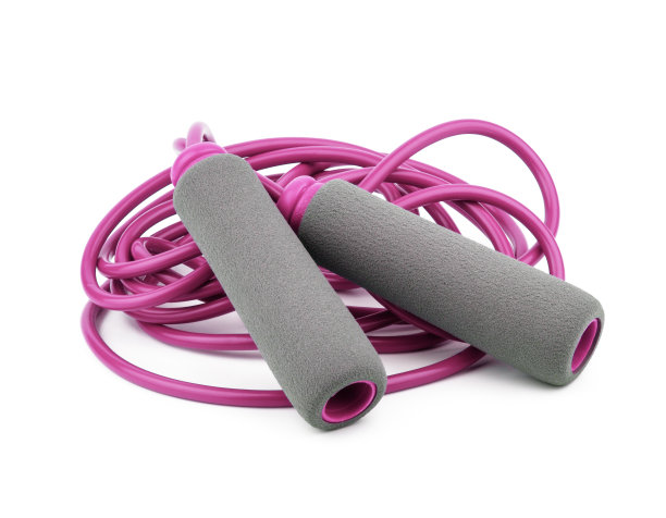 粉红色的跳绳孤立在白色的背景上图片下载