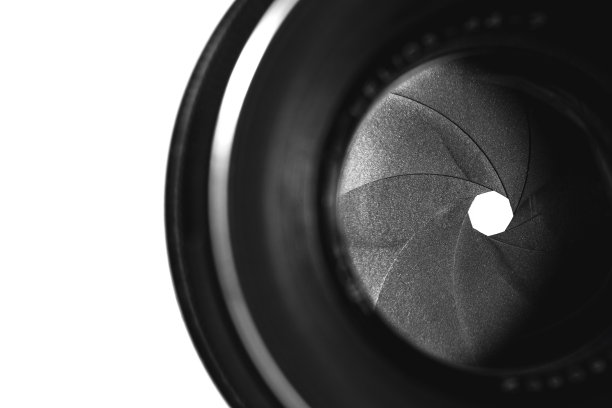 微距关闭光圈的相机镜头上的白色背景图片下载