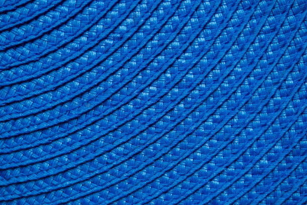 特写蓝色圆形纺织垫子的一部分。抽象背景，选择性焦点，顶视图图片下载