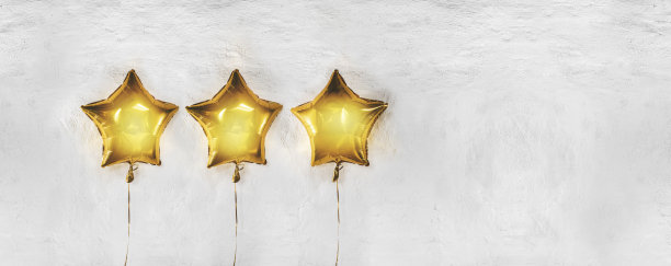 回顾概念与金星气球在白色的石头背景图片下载