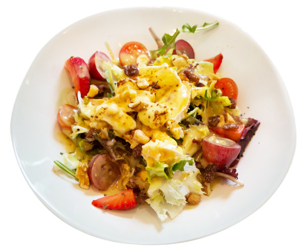 山羊奶酪，樱桃番茄，芝麻菜，坚果和葡萄干沙拉图片下载