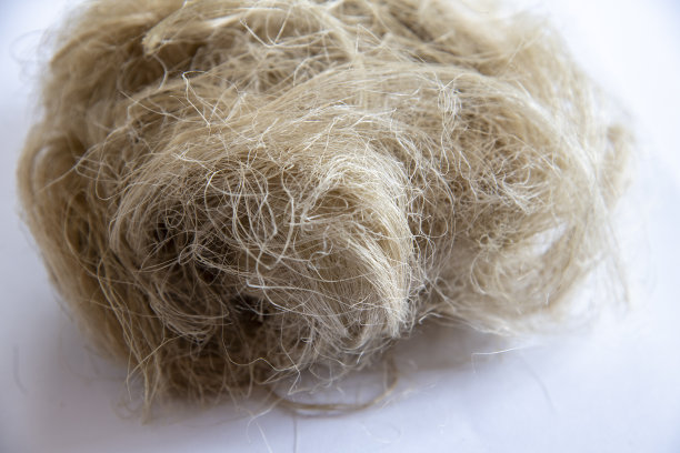 天然亚麻纤维在一个轻的背景图片下载