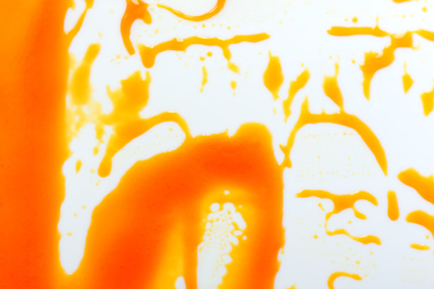 为创意设计的橙酱微距照片。图片下载