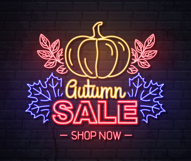 霓虹灯标志秋季大甩卖与南瓜在砖的背景。老式电动招牌。图片下载