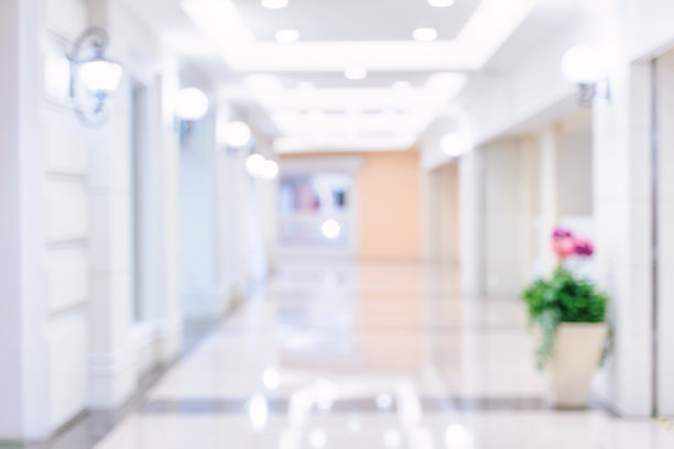 豪华百货商场的室内设计，抽象散焦模糊与散景背景，购物季节的概念设计。图片下载