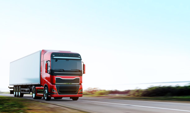 带拖车的半卡车在路上行驶图片下载