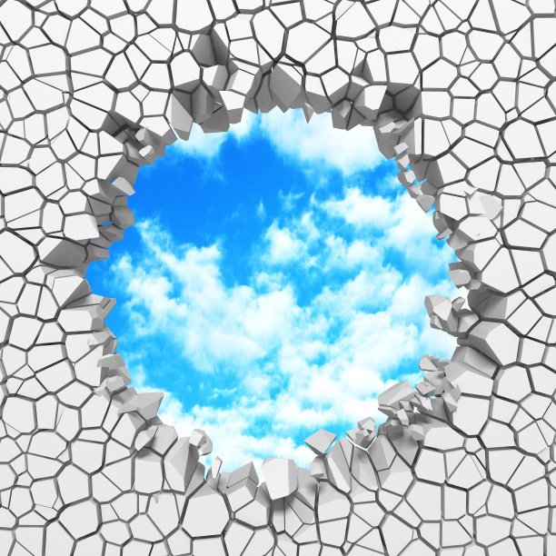 Сracked白墙破洞到多云的天空图片下载