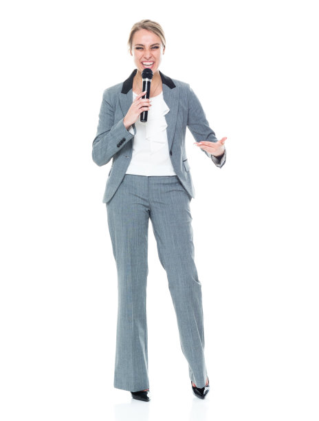 快乐的女商人拿着麦克风图片下载