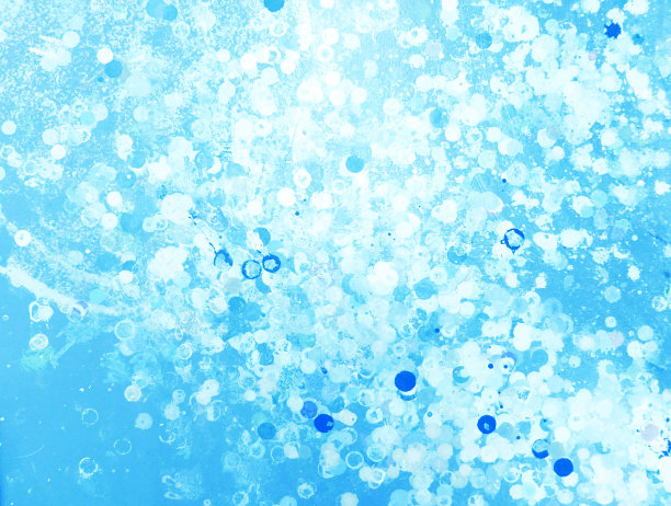 蓝色背景与墨水飞溅。图片下载