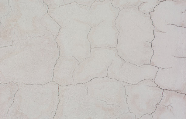 墙上有裂缝。光背景。纹理背景图片下载