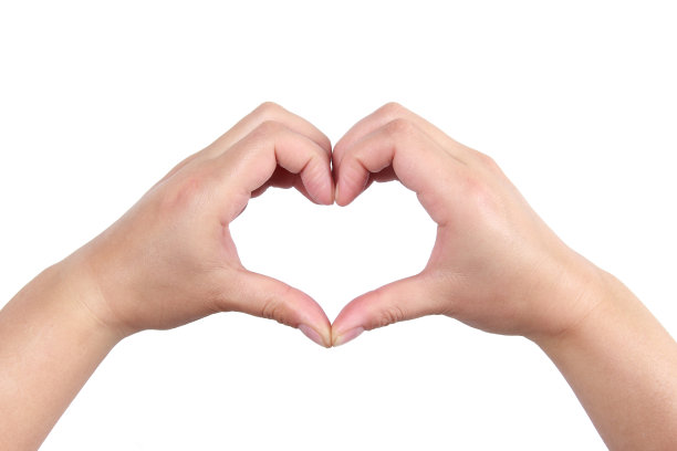 女人的手在白色的背景上做一个心的形状图片下载
