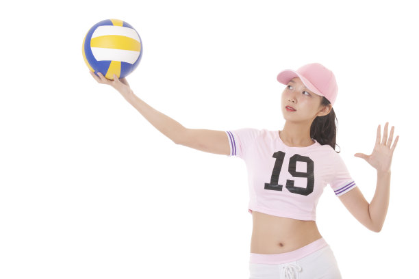 一个亚洲青少年拿着排球的肖像图片下载