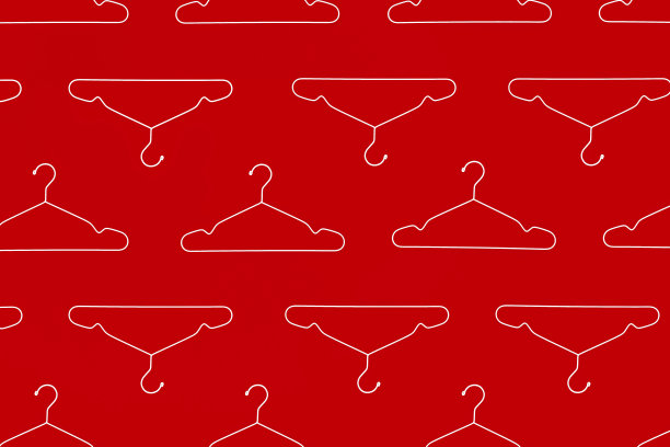红色背景上的时尚衣架图案。图片下载