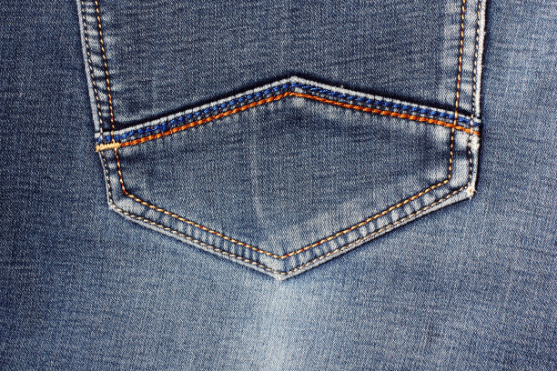 织物的背景。织物织物表面的俯视图。衣服特写。抽象的照片。牛仔裤图片下载