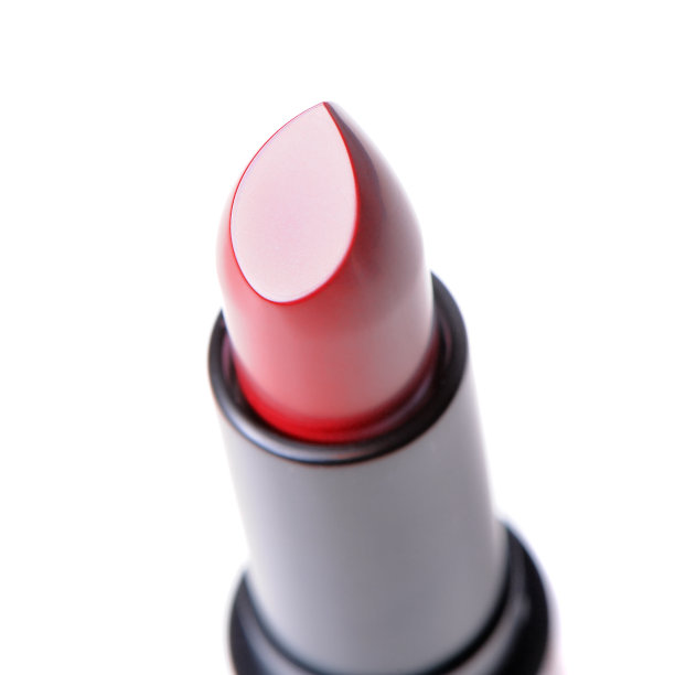 白色背景上的红色口红图片下载