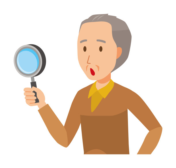 一位穿着棕色衣服的老人拿着放大镜图片下载