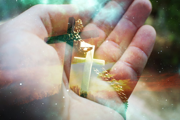 美丽的宗教抽象艺术与黄金耶稣基督象征日落和银河背景高质量图片下载