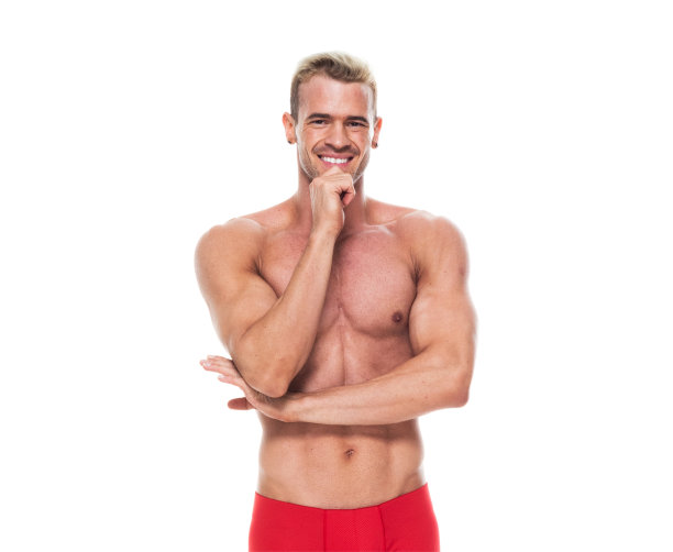 正面图片/腰部以上的20-29岁的成年英俊的人/苗条的白人年轻男子/男性站在白色背景下穿着内裤/男性内裤/半裙/四角短裤/图片下载