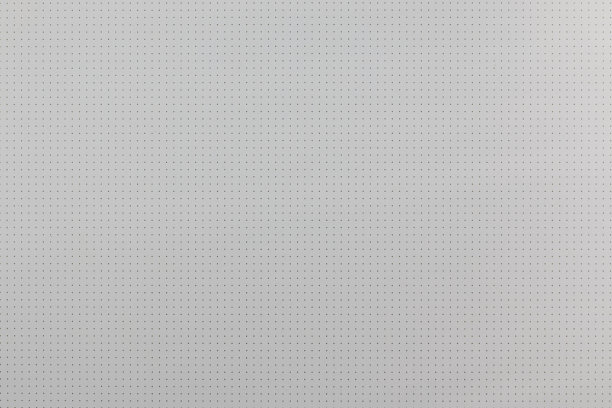 抽象的背景。空的白色表面上有小孔或小点。抽象的背景。空的白色表面有小洞。多孔塑料盘子图片下载
