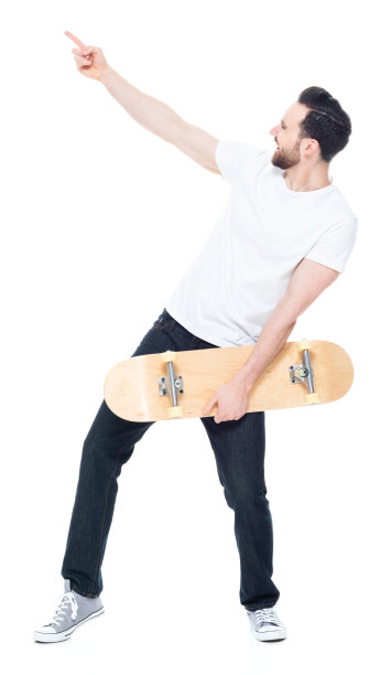 一个男人只有/完整的长度30-39岁的成年人英俊的人白人男性/年轻男子滑板/滑板/溜冰在白色的背景穿着牛仔裤谁是微笑/快乐/愉快/凉爽的态度谁是显示/指向图片下载